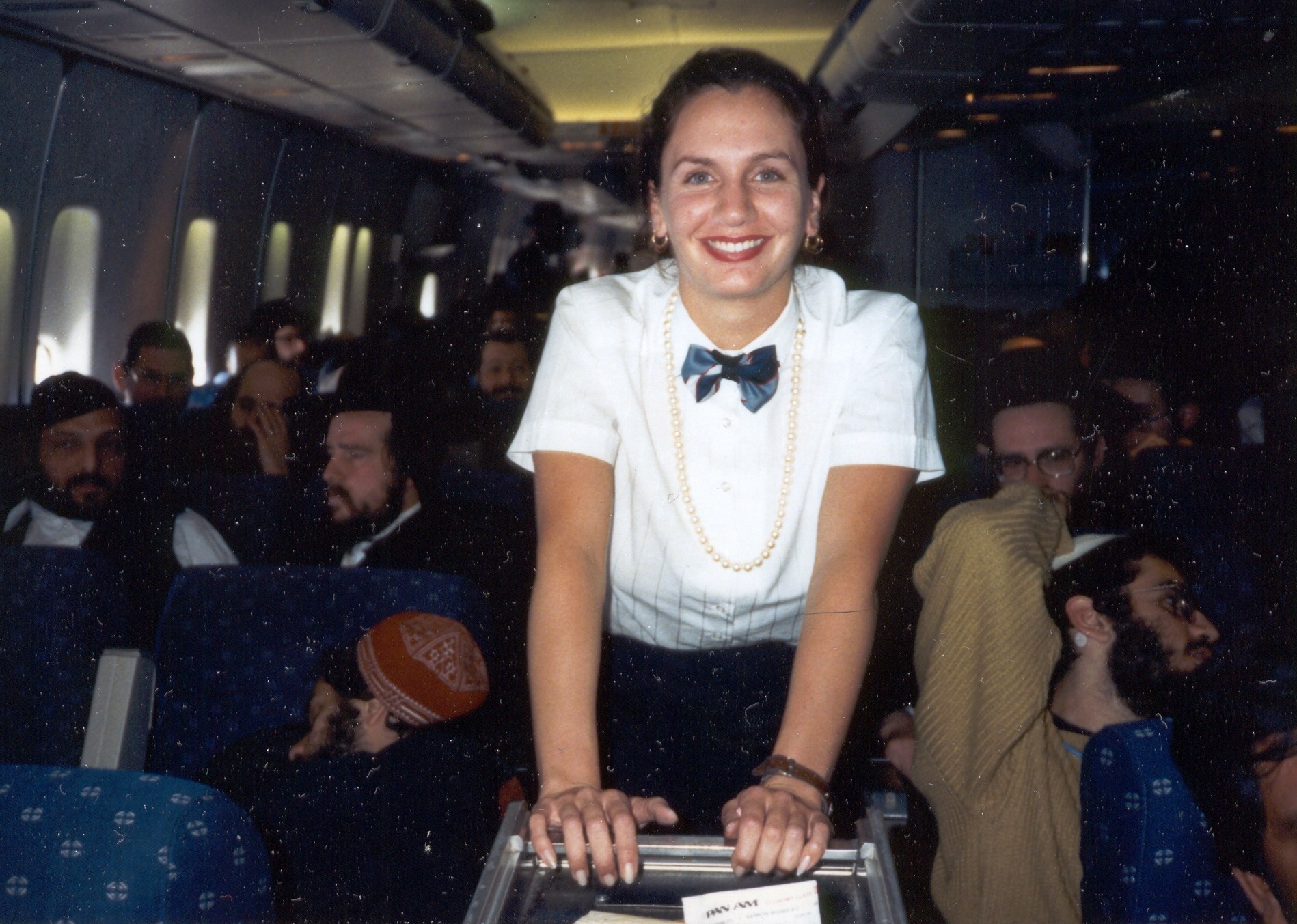 1991 September  Flight 31 Moscow - New York JFK Jane Andreassi serving customers in the Economy Cabin of a Pan Am 747.
